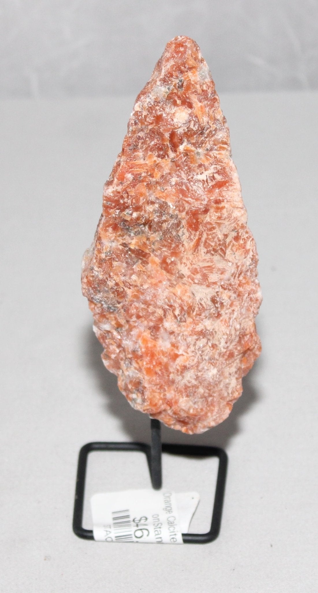 Orange Calcite Specimen on Stand