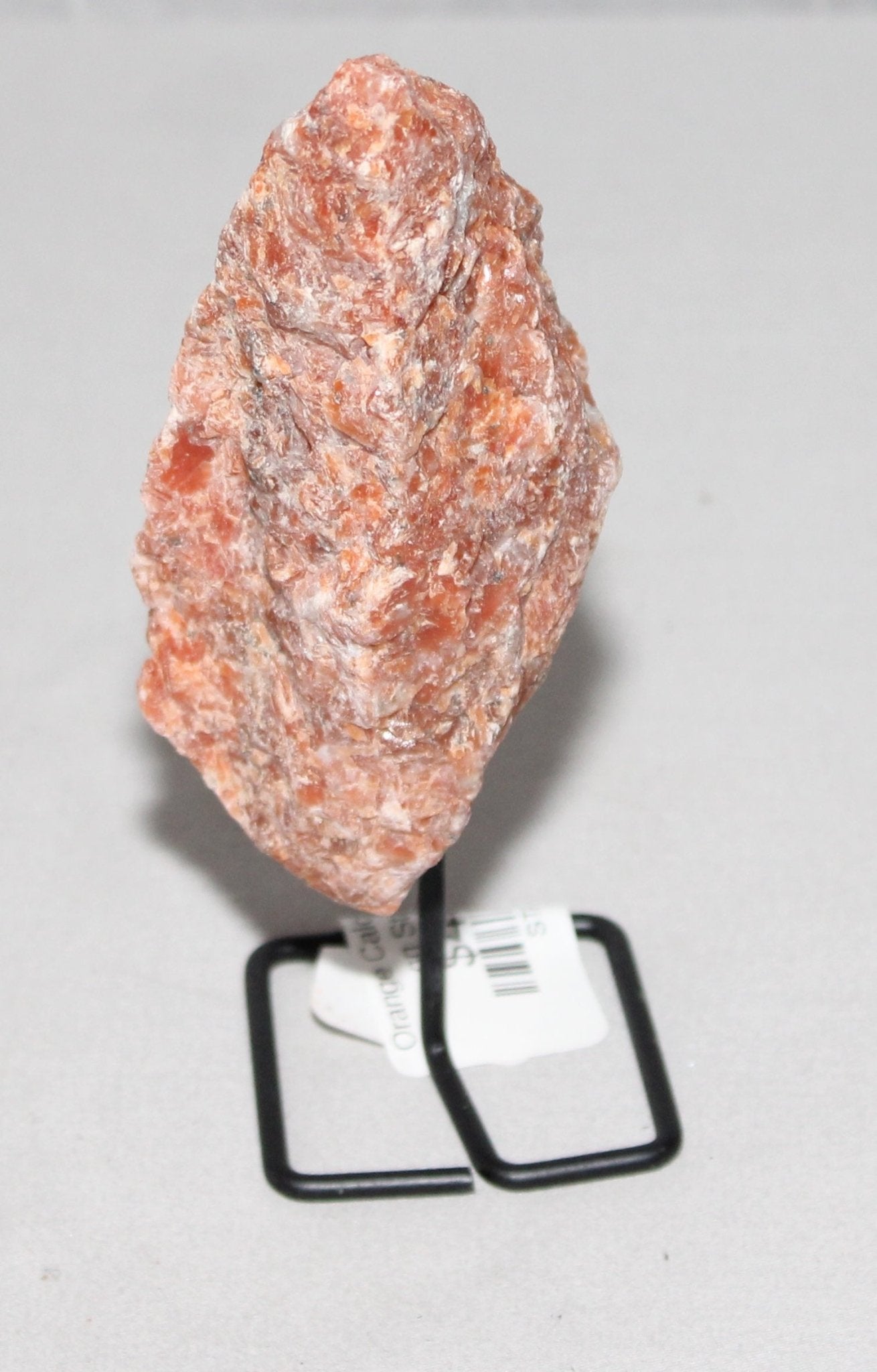 Orange Calcite Specimen on Stand