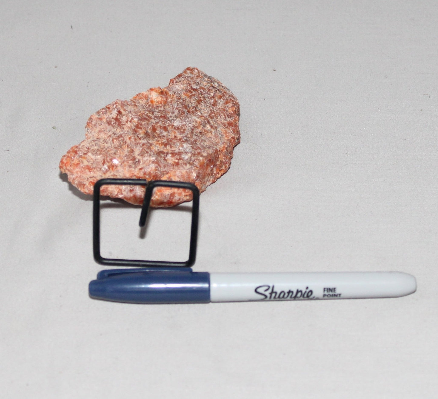 Orange Calcite Specimen on Stand