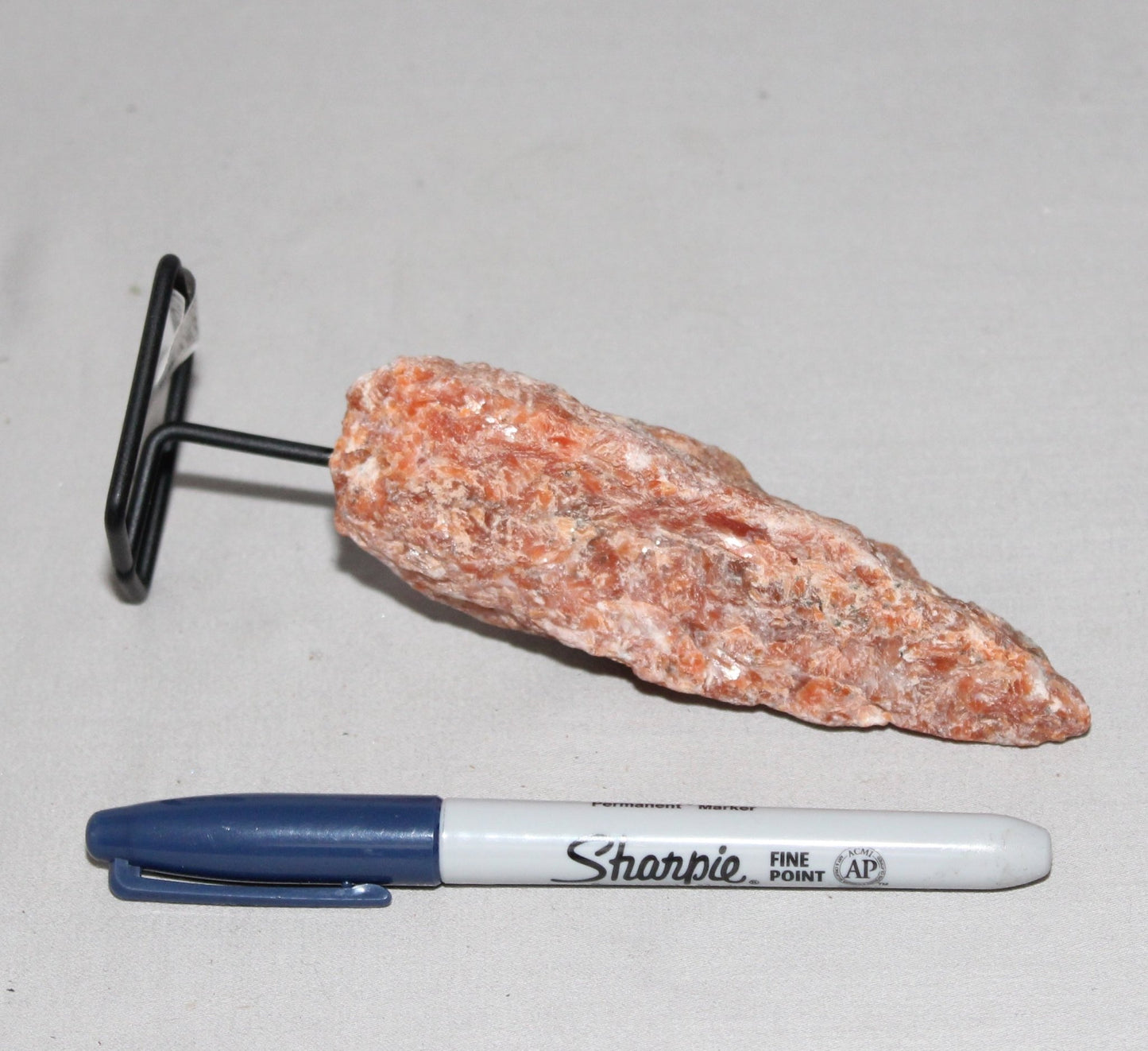 Orange Calcite Specimen on Stand