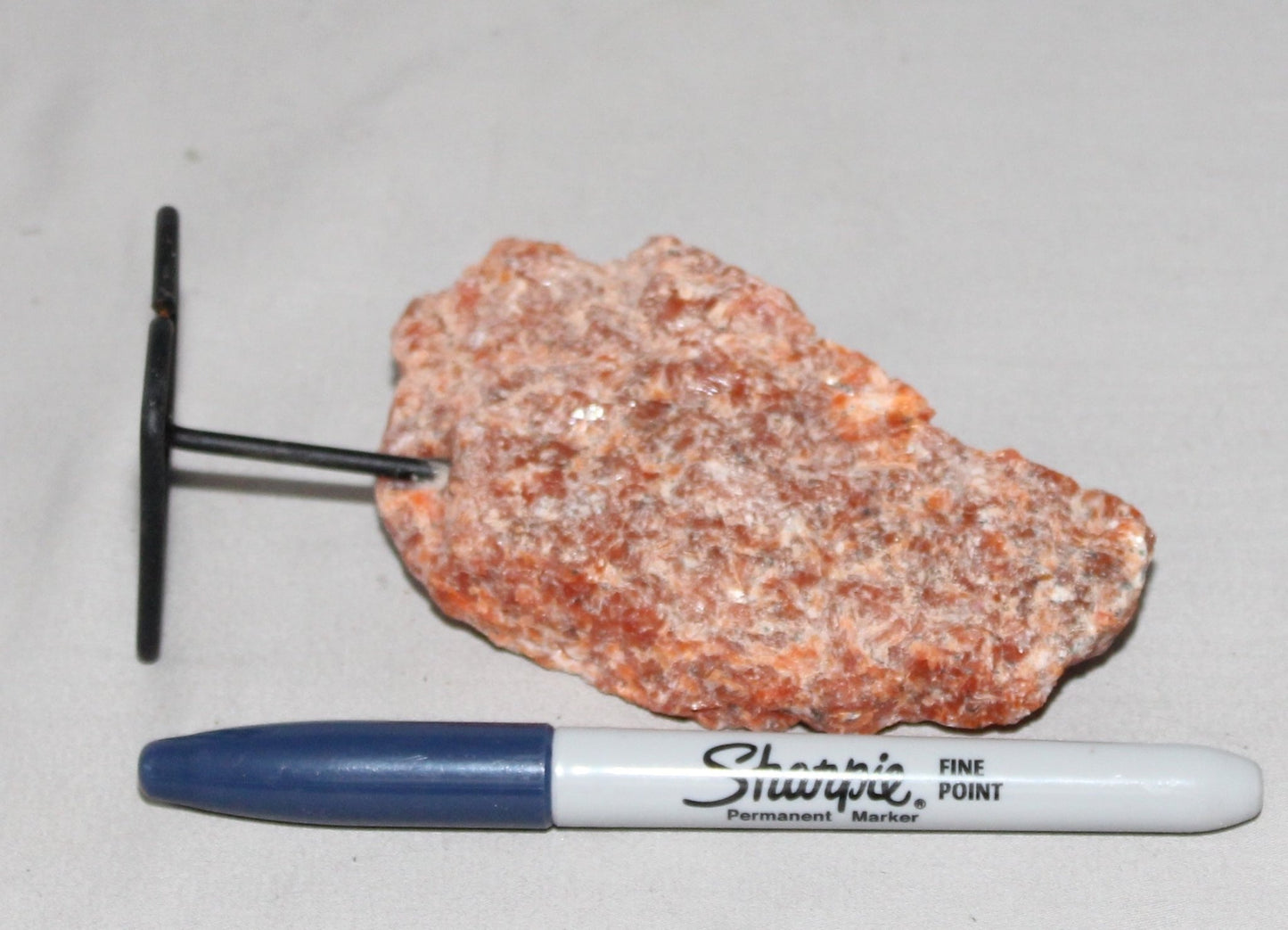 Orange Calcite Specimen on Stand